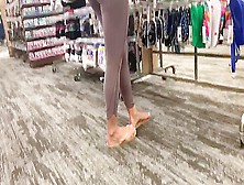 Spying Hottie In Sexy Leggings And Flip Flops At The Socks Store