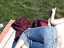 November Feet Sunbathing In Blue Jeans