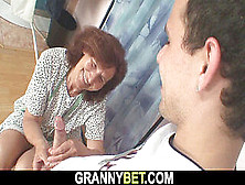 Youthful Customer Pokes Sewing Granny