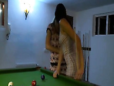 Two Models In Shoes On Billiards Table