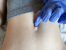 Belly Button And Medical Gloves