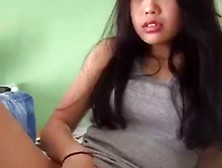 Asian Girl Rubbing Her Pussy For Camera
