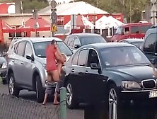 Boy With Girl Having Sex On A Car In The Bazaar.
