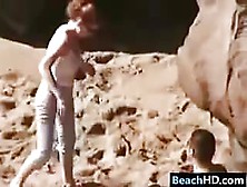 Slut Gives A Blowjob At The Beach