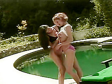 Pool Side Lesbian Lust Between Two Sexy Babes