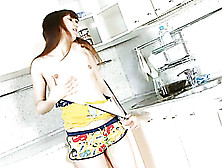 Blue And Yellow Brunette Masturbating On The Kitchen Counter