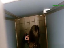 Woman Spied In Public Toilet