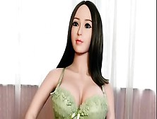 Cute Oriental Love Doll In Green Bikini With Humongous Boobs Ready For Doggystyle