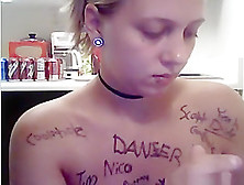 Ponytailed Blonde Girl Writes All Kinds Of Words On Her Naked Body In The Kitchen