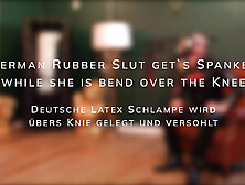 German Rubber Slut Gets Spanked While She Is Bend Over The Knee