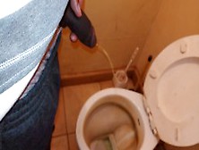 Pissing In A Toilet