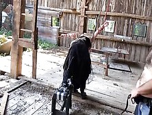 Bound Up And Nailed By Machine Inside Barn