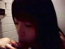 Mouth-Filled Asian Chick Dick Sucking While Seated In The Toilet