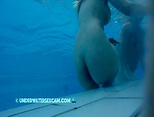 This Lovely Girl Shows Her Big Tits Underwater In The Pool While The Cam Is Watching Her!