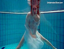 Redhead Hottie Diana Zelenkina Undresses Her Swimsuit Underwater