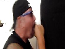 Tattooed Dilf Sucks Cock Through Gloryhole Till Cum In Mouth