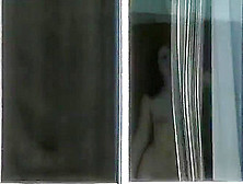 Horny Cunt Undresses In Front Of The Window And Fingers Her Pussy
