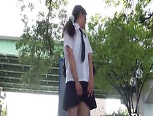 Japanese Schoolgirls Hide In The Back Yard To Toy Pussies