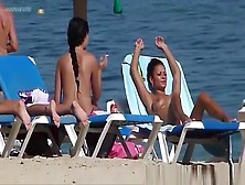 Pretty Topless Girls Sunbathing On The Beach