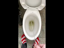 Pissing At Home In Red And White Socks