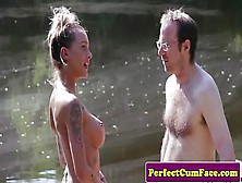 Busty Femdom Tugging Guy Outdoors For Spunk