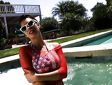 Curvy Brunette Woman Showing Her Nice Natural Boobs In The Pool