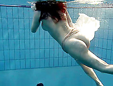 Teen With Nice Ass Swimming Passionately In The Pool