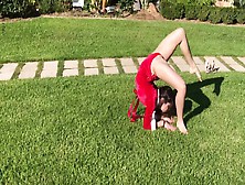 Stretching Outdoors In Red - Watch4Fetish