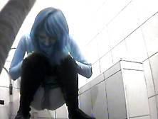 Blue Haired Babe Is Peeing In The Toilet