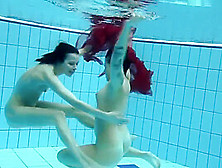 Two Underwater Girls Loving Eachother