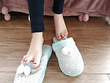 Sweet Candid Youngster Feet,  Playing With Her Cozy House Slippers.