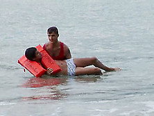 Horny Gay Fellow Fucks A Lifeguard On A Nice Beach