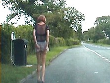 Zoe's Micro-Skirt Lifted By The Wind To Expose Her