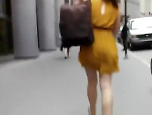Woman In Short Yellow Dress