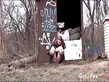 Cute Girl Walks The Railroad Tracks And Pees