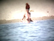 Intriguing,  Hot Redhead In A Nude Beach Video