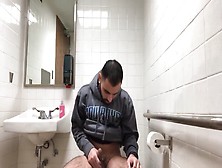 Hidden Camera Catches Young Jock Cumshot In Restroom