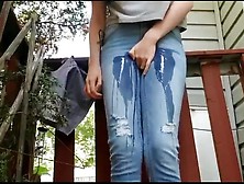 Wetting Jeans On The Balcony