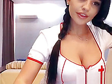 Cute Brunette Girl In Nurse Uniform