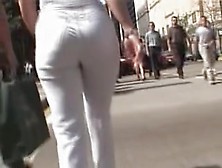Girl In White Trousers Is On The Street Candid Video 06M