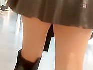 Exhibitionist Wife In Short Latex Skirt Bending Over