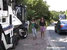 Two Hot Girls Peeing Near A White Truck