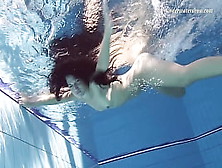 Gypsy Ebony Haired Babe Swimming Underwater