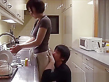 Asian Babe With Nice Ass And Big Tits Gives Tit Job And Bj In Kitchen