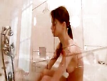 Naked Babe Showers At Bathroom