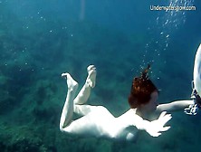 Young Babes Swim Naked And Alone