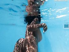 Yorgelis Carrillo,  A Famous Pornstar,  Glides Nude Through The Water