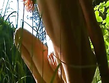 Petite Spanish Chick Peeing In A Forest