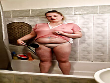 A Chubby Student Girl Takes A Shower In A Pink T-Shirt