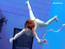 Curly Hair Redhead Swims And Looks Sexy